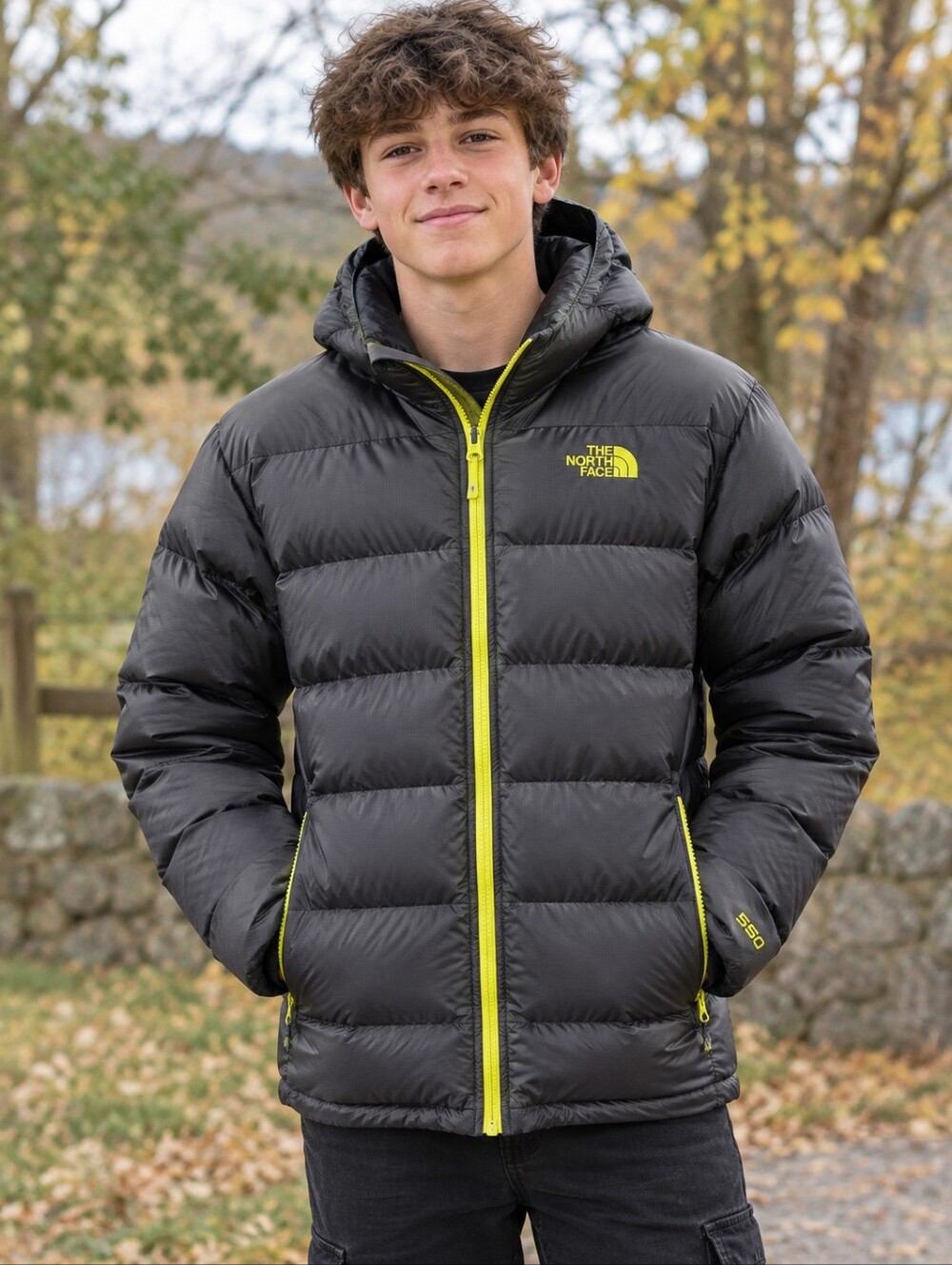 The North Face Kids Black Puffer Jacket with Yellow Zipper
